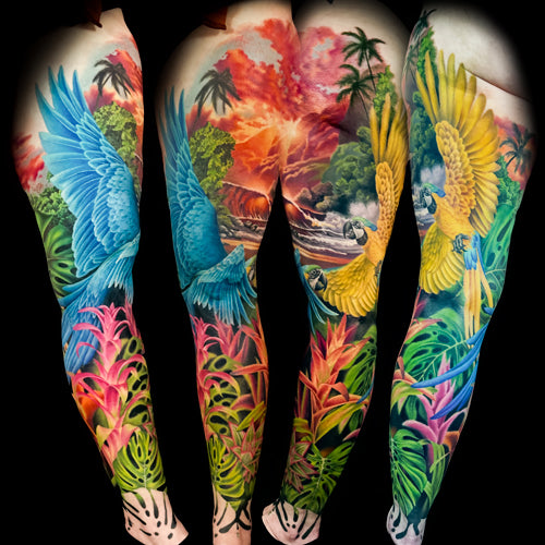 vibrant realistic tropical sleeve tattoo by Liz Venom